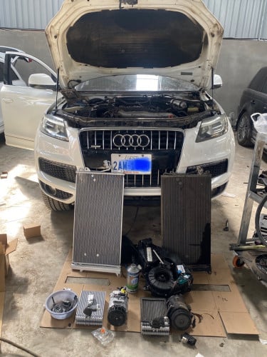 Audi Q7 ជួសជុលម៉ាសុីនត្រជាក់ គ្រឿងក្រោម
