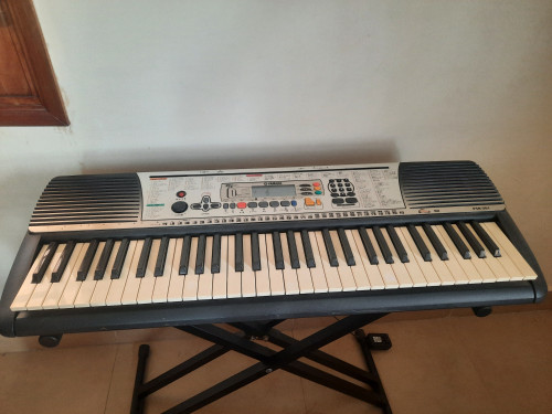 Gently used portable keyboard synthesizer (Yamaha PSR-201) with