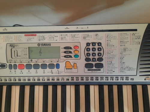 Gently used portable keyboard synthesizer (Yamaha PSR-201) with