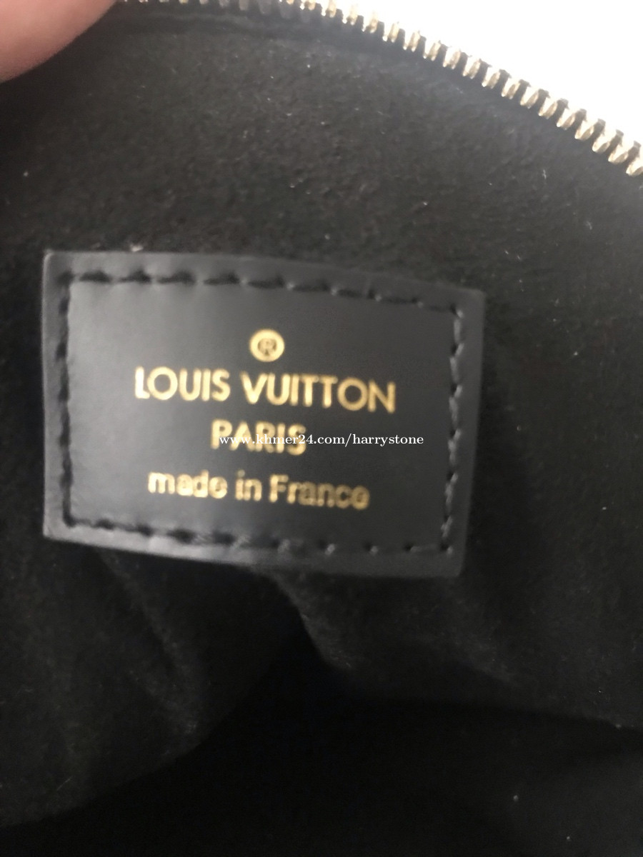 Toupie cloth handbag Louis Vuitton Brown in Cloth - 16488916