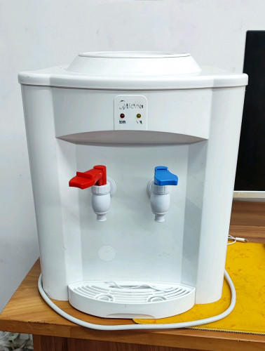 Midea water dispenser heated room temperature