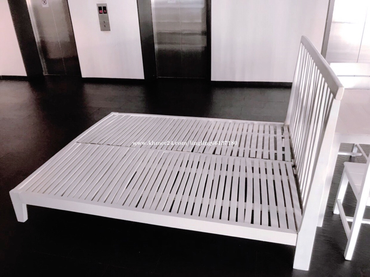 Wooden bed with white paint Price 65.00 in Boeng Trabaek, Cambodia