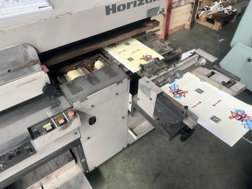 ម៉ាស៊ីនបិតសៀវភៅ​ Book binding machine