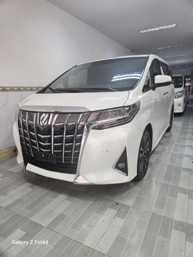 Toyota Alphard 2015 ឆ្វេង (កែ) ក្រដាស់ពន្ធ