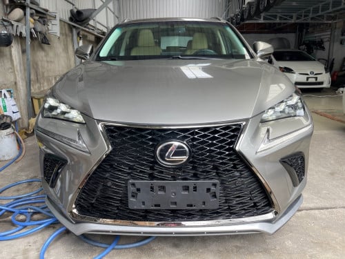 តម្លៃ​ចចារបាន​ Lexus NX200t 015 up 018 ពណ៌​ទីតានីម​ ក្នុងលឿង​ ពូកស្បែក​សុីន100%​ ពន្ធថ្មី​