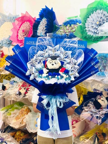 បាច់ផ្កាមេអំបៅ តុក្កតា