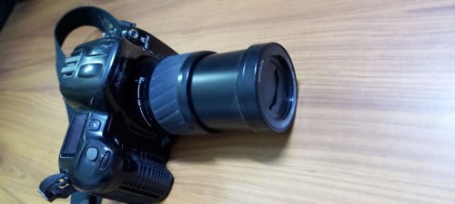 1-កាំម៉ារ៉ាMinolta Dynax 807Si + 24-85mm Film SLR Camera2-AiwaRadio AM3-កូនវិទ្យុ The Aiwa CR-AS9