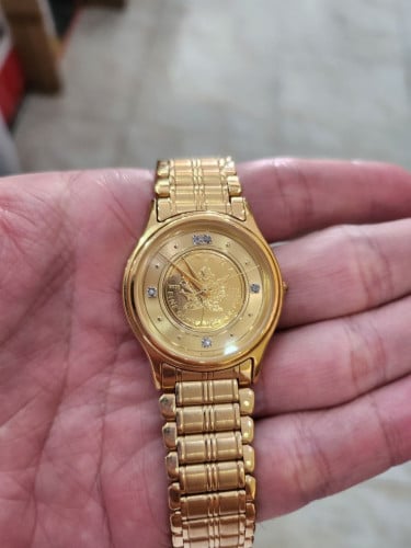 នាឡិកាកាក់មាស