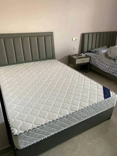 Bed with mattress