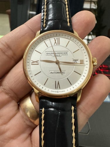 BAUME & MERCIER Rose gold ( ផ្លាក់ទិនតាន់ទឹក 750 18k )