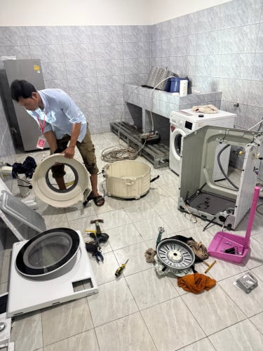 ជាងជួសជុលម៉ាសុីនបោកគក់ និងសម្ងួត