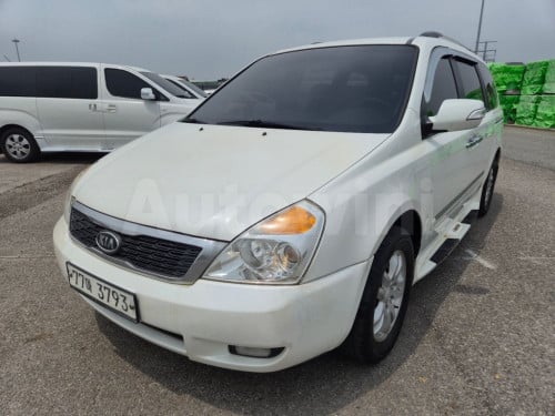 2012 Kia Grand Carnival GLX ម៉ាស៊ូត 11កៅអី ទ្វារអូតូ បើកតំបូល