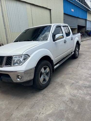 Nissan Frontier 07(បង់រំលស់100%)