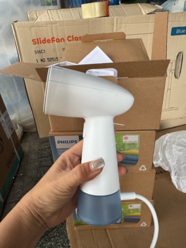 ឆ្នាំងអ៊ុតចំហាយទឹក កាន់ដៃ Phillips Mini Steamer STH1000/10