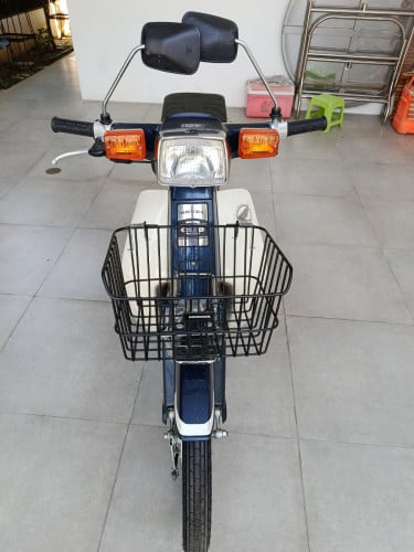 Honda cub 90 tax paper price 1650$  phone 093345679