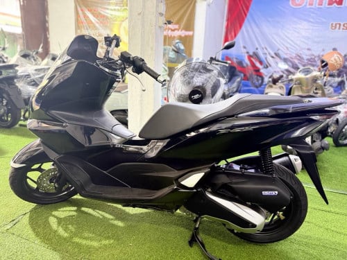 PCX 023,125cc សាណុំ សុីន ១ជុំទឹកថ្នាំ