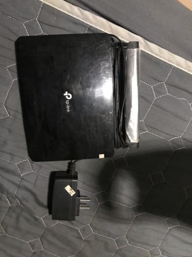 Router ដាក់សុីមបានគ្រប់ប្រពន្ធ័ អុីនធឺណេតលឿនទិញមកដាក់ប្រើមួយរយះ TP link