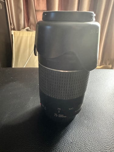 Len canon 75-300. 95%