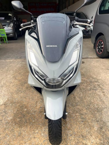 Pcx2021ជប៉ុន125ccពណ៌សុីម៉ុងមានប្រាំABSមុខក្រោយក្រដាស់ពន្នទិញដាច់វៃដូបង់រុំលួស25ខេត្តក្រុងដំលៃ2600$