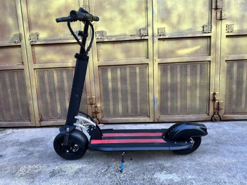 ស្គូតទ័រម៉ូទ័រមួយទឹកសុិងកាពួរ