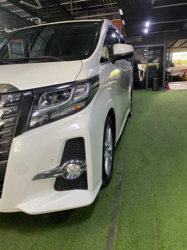 Toyota Alphard ឆ្នាំ 2015 ពណ៍ស ក្រដាស់ពន្ធ