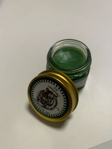 ប្រេងក្រឡា ត្រារូបក្បាលខ្លា  បោះដុំនិងរាយ