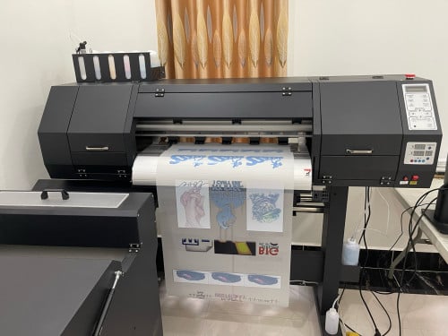 លក់ម៉ាស៊ីនបោះពុម្ភឡូហ្គោ និងរូបភាពលើអាវយឺត (DTF Printing Machine)