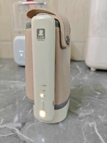 ម៉ាស៊ីនកម្ដៅទឹកដោះ