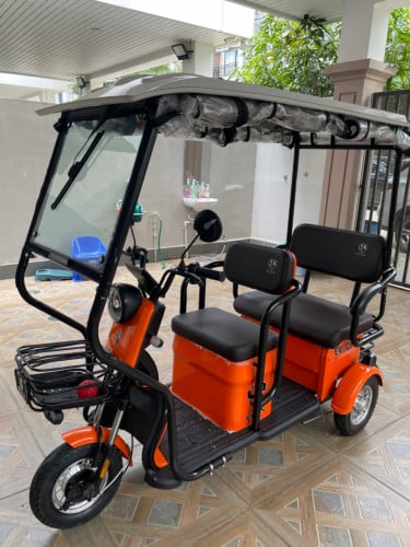 កង់បីអាគុយទើបទិញមានបណ្ណ័ធានា