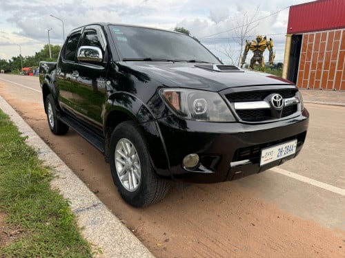 Hilux Vigo 06 ប៉ុង2 អូតូកាប់តាស់ ឆ្វេងស្រុីន(បង់រំលស់បាន)