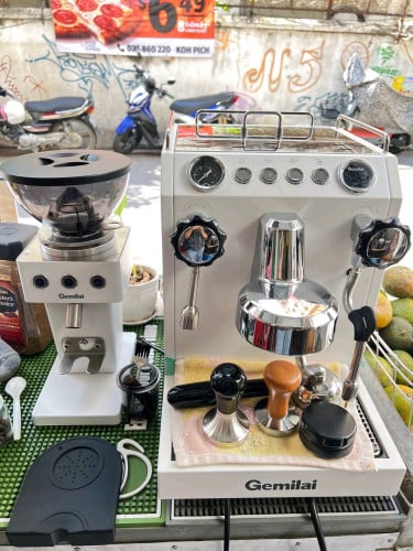 ម៉ាសុីនកាហ្វេដៃមួយ ឆុង ស្ទីម ជាមួយគ្នា ប្រភេទចាក់ទឹកងាយស្រូលចល័តកន្លែង នៅស្អាត 99%