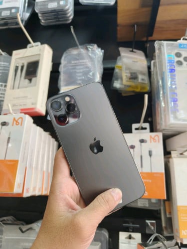 Iphone 12Pro Max New 98% LL/A ថែមសម្បក Screen ឆ្នាំងសាកនិងដឹកជញ្ជូន ធានាហ្សុីនណែន លេងទឹកបាន