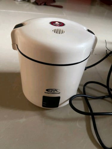 ឆ្នាំងបាយខ្នាតតូចដាំបានមួយកំប៉ុងនៅស្អាតដាំបាយឆ្អិនល្អ