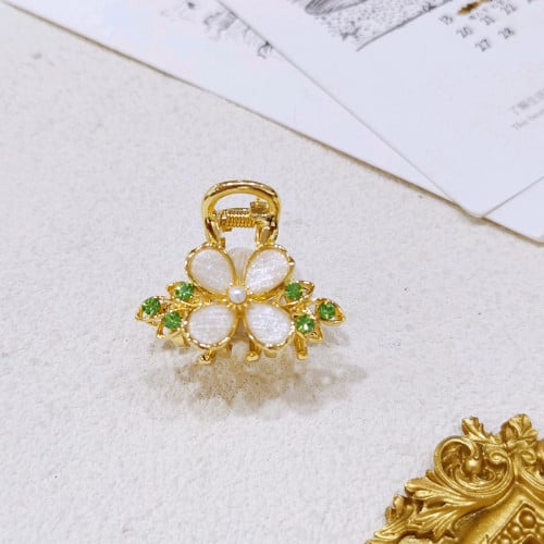 ដង្កៀបគ្របដណ្ដប់ជាមួយនិងត្បូងពិតៗ100%