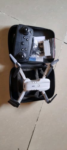 តារ៉ូនមួយទឹកនៅដំណើរការធម្មតាអាចភ្ជាប់កាមេរ៉ាពីទូរសព្ទបានមានថ្មពីរគ្រាប់មានស្លាតសម្រាប់ផ្លាស់ប្ដូរ