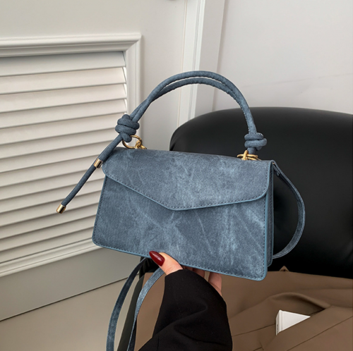 កាបូបយួរដៃ (Small handbag)