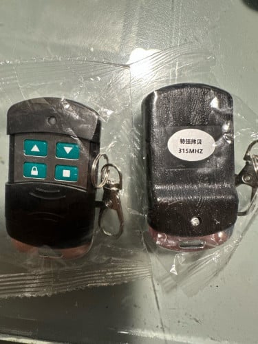 តេឡេ បញ្ជាទ្វារ រមូរ ប្រេងកង់ 315MHZ