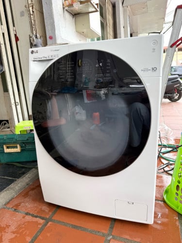 ម៉ាសុីនបោក LG 15kg ថាច់កញ្ចក់សេរីខ្ពស់