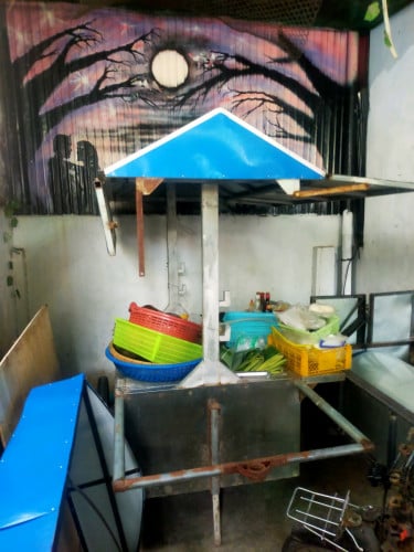 រទេះលក់ជ្រូកអាំង (លក់)