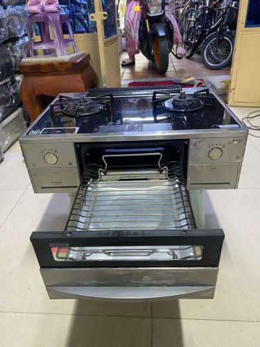 ចង្ក្រានហ្គាស១ទឹកជប៉ុនមុខអុីណុកលើកញ្ចក់កំណត់នាទីដាក់ឆ្នាំងលើបានឆេះ