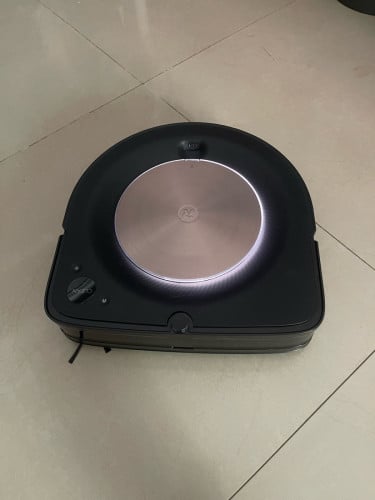 iRobot S9+ model working hard and force sucking