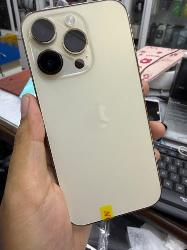 14Pro 128GB Gold 99ស្អាត ប្រើ Sim1+ESim
