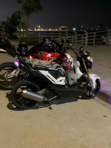 Zoomer-x 016 វៃដូរដាក់លេខ