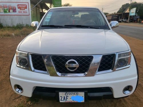 Sale Nissan Frontier 06 ពណ៌ស ប៉ុង1