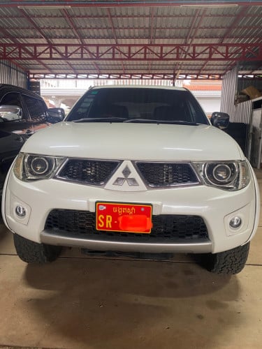 Mitsubishi Triton 013 ពណ៌សAuto អត់​ កាប់ពីតាស់ទេ​ ឡានធានាឡានស្អាតត់បុកអត់ជុលទេ