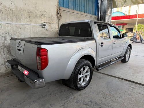 Nissan Navara 06ម៉ាស៊ូតប៉ុង2អូតូកាពីតាស់ដំបូលបេីក