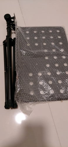 ជើង ដាក់សៀវភៅ អ្នកភ្លេង