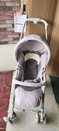 រទេះកូនក្មេងមួយទឹកមកពីជប៉ុនតម្លៃសមរម្យនៅថ្មីស្អាត 90%