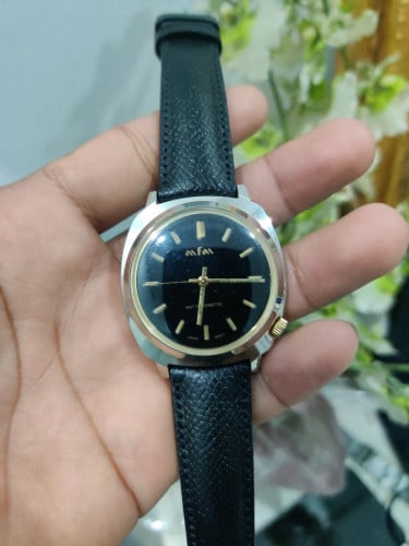 នាឡិកាដៃបុរស vintage 1960s ម៉ាស៊ីនស្វីស ម៉ូឡាន មួយទឹកពីជប៉ុន