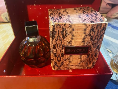 Jimmy Choo original 99% left 50$